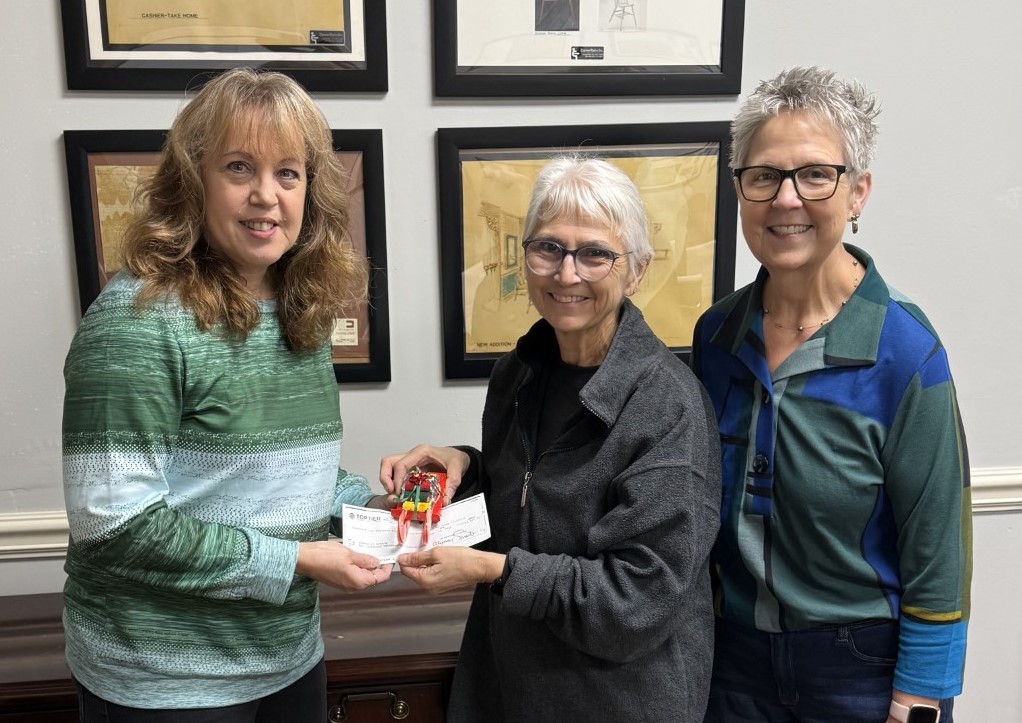 (L-R) Cheryl Craft, Community Action, Inc. Case Manager, accepts a check from Joan Kriebel and Jayne Daugherty following their 2025 Santa Sleigh sales. The donation will be used to provide support services to homeless or at-risk-of-being homeless veterans and their families in Clarion County.